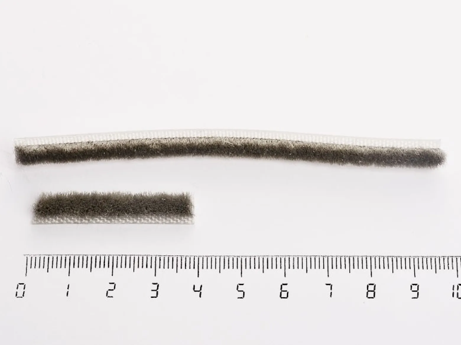 Børsteliste til øvre dørskinne